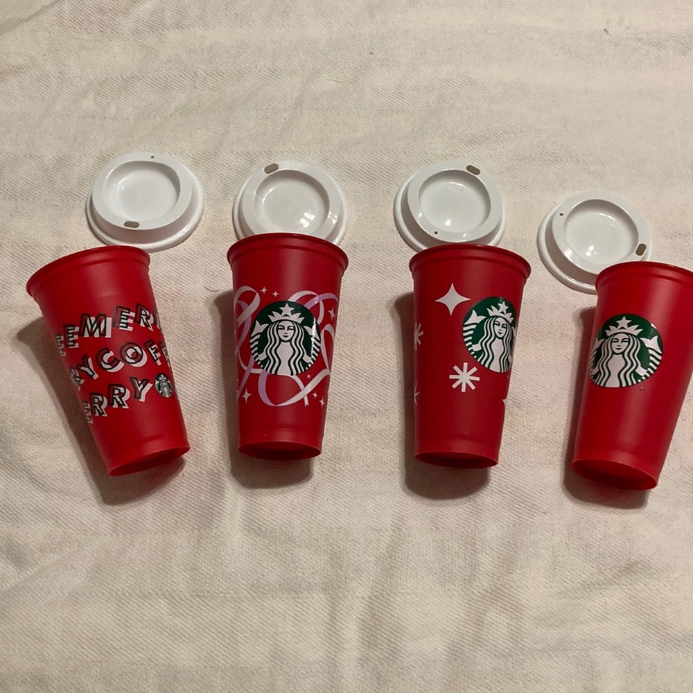 Set of four Christmas travel reusable Starbucks mugs